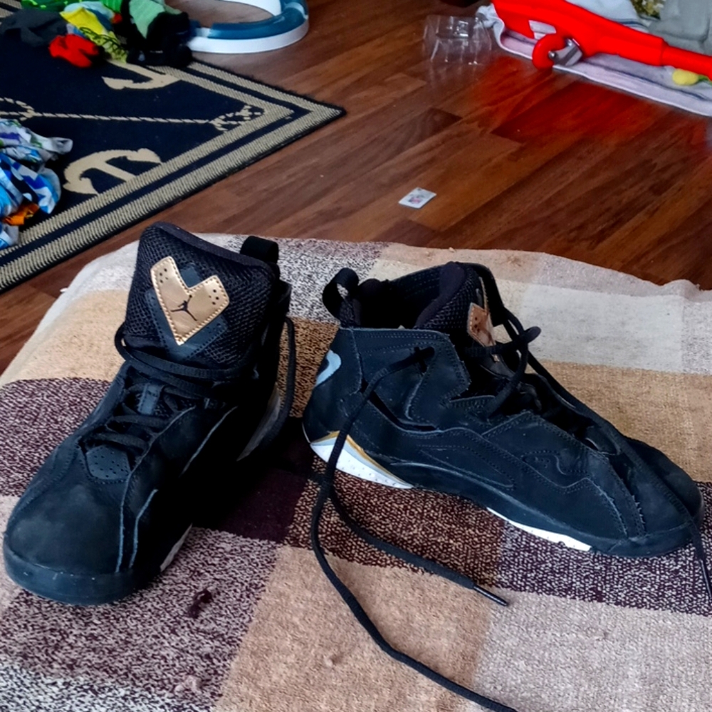 Black Jordan's with gold and white